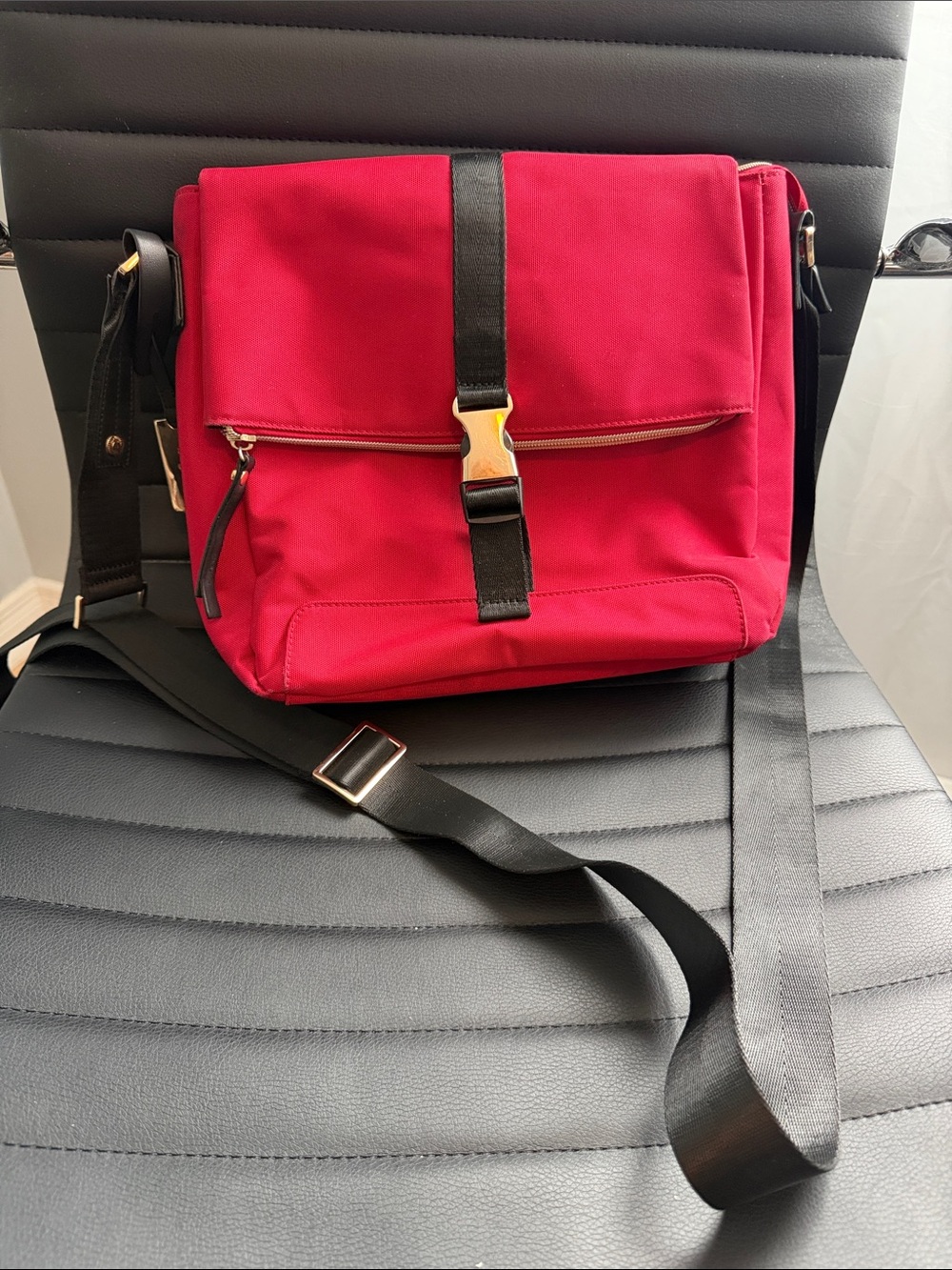 Bugatti Red Crossbody Bag with Black Strap and Gold Buckle